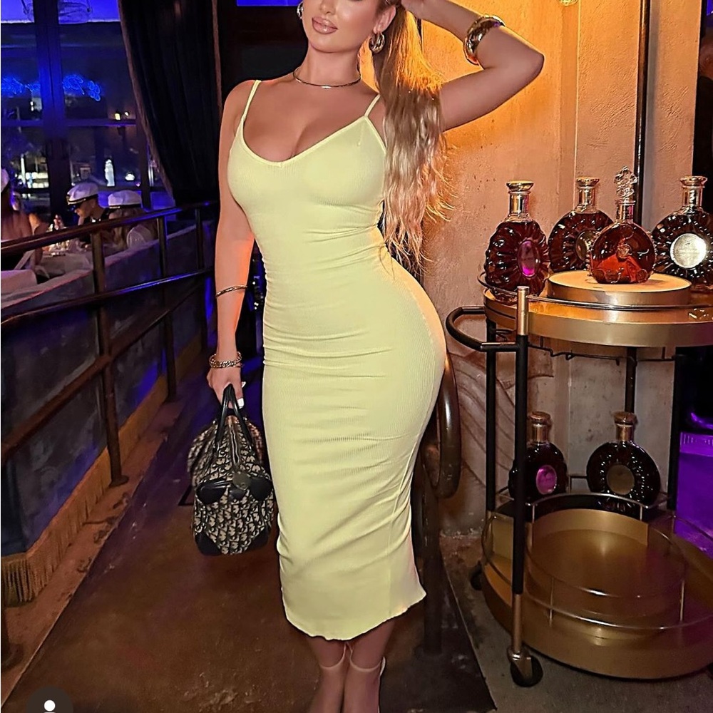 Neon yellow body con dress